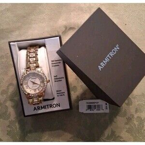 Watch Armitron Women's 75/3996MPGP Genuine Crystal Goldtone Not Working